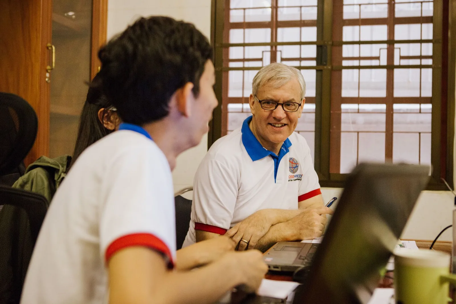 Paul working with his developers at Khalibre